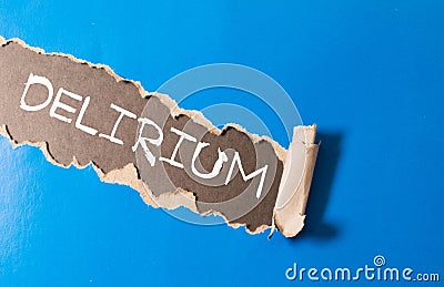 Delirium word written under torn paper, concept Stock Photo