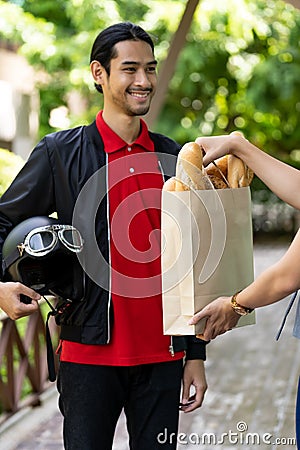 Deliverly man pick up order Stock Photo