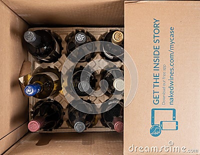 Delivery of case of wines from Naked Winery in cardboard box Editorial Stock Photo