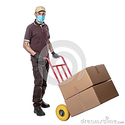 Delivery man with mask for covid-19. handtruck with packages Stock Photo