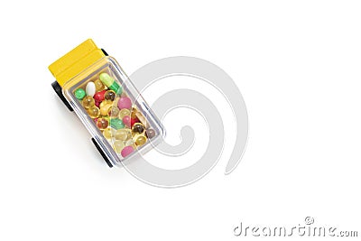 Delivery of medicines and tablets. Moving the vehicle from which on-the-go pills. Yellow truck on a white Stock Photo