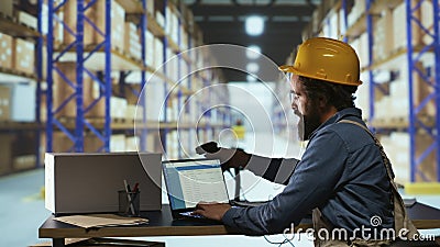 Delivery supervisor scanning barcodes for product logistics Stock Photo