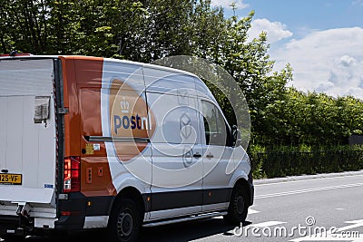 Delivery van of the Dutch postal company 'PostNL' Editorial Stock Photo