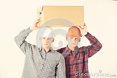 Delivery, warehouse and parcel concept. Men with serious faces Stock Photo