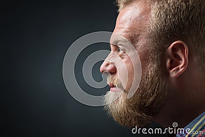 Demanding bearded man Stock Photo