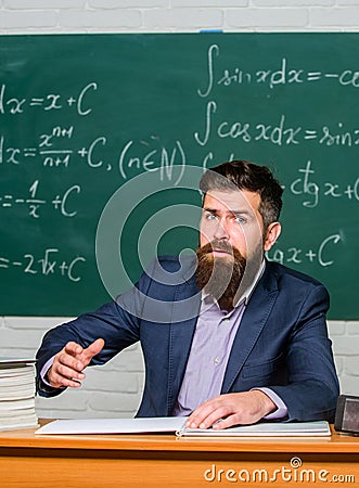 Demanding teacher. Get out of class. Teacher strict serious bearded man chalkboard background. Teacher looks threatening Stock Photo