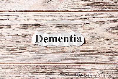 Dementia of the word on paper. concept. Words of Dementia on a wooden background Stock Photo