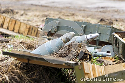 Demining by troops of the territory. Many mines, shells, artillery, grenades, fragmentation grenades Stock Photo