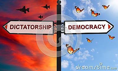 Democracy or Dictatorship choice on a signpost with arrows in two opposite directions Stock Photo