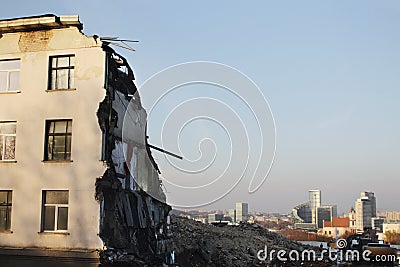 Demolished old building remains with city view Stock Photo