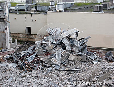 Demolition of building in urban environments. Stock Photo