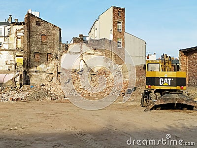 Demolition work and construction machinery near the ruins in Kielce, Poland Editorial Stock Photo