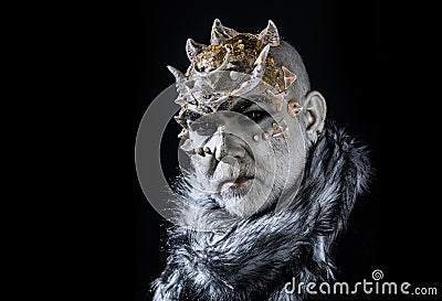 Demonic creature with thorns on head isolated on black background. King of realm of perpetual cold. Man with fictional Stock Photo