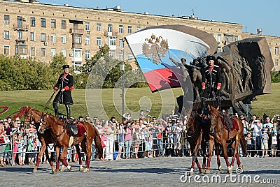 Demonstrative performance by the Kremlin Riding School on Poklonnaya Hill in honor of the Russian Flag holiday. Editorial Stock Photo