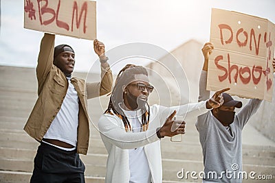 Demonstrators with banners in streets Editorial Stock Photo