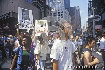 Demonstrators marching at AIDS rally Editorial Stock Photo