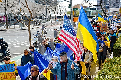 Demonstrators protesting in the streets of New York to show solidarity for Ukraine Editorial Stock Photo