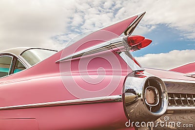 Rear end of a classic pink Cadillac fifties car Editorial Stock Photo