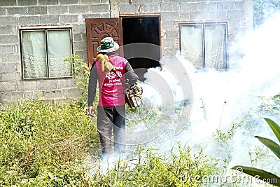 Dengue fever prevention, Fogging, mosquito Smoke spray to get rid of mosquitoes , 30 January 2024 , Buriram Thailand. Editorial Stock Photo