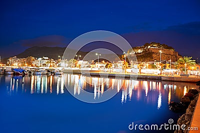 Denia sunset with castle and marina in Spain Stock Photo