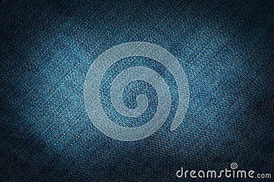 Denim abstract background with copy space for text with dark vignette, blue jeans fabric texture, youth concept Stock Photo