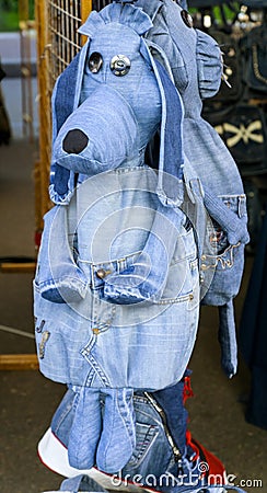 Denim rucksack dog Stock Photo