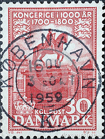 DENMARK - CIRCA 1955: A postage stamp from Denmark showing an equestrian statue of King Federik V. In front of Amalienborg Palace Editorial Stock Photo