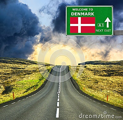 Denmark road sign against clear blue sky Stock Photo