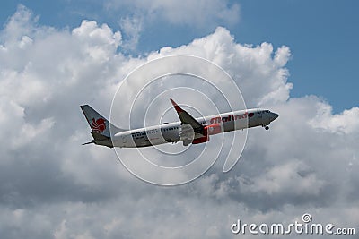 DENPASAR/BALI-APRIL 17 2019: DENPASAR/BALI-APRIL 17 2019: Airplane owned by Malindo Airlines is taking off from Ngurah Rai Bali Editorial Stock Photo