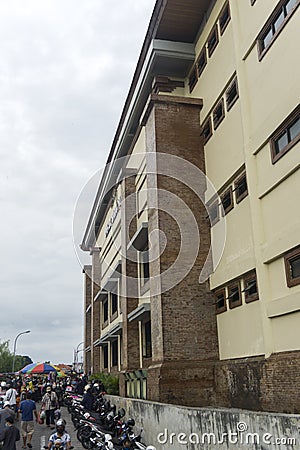 The outer wall of the Denpasar traditional market building with many windows. Editorial Stock Photo