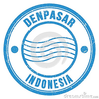 DENPASAR - INDONESIA, words written on blue postal stamp Stock Photo