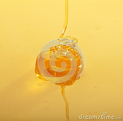 Dense dripping honey Stock Photo