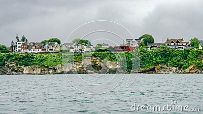 Densely packed ocean view houses in Narragansett after a storm Stock Photo