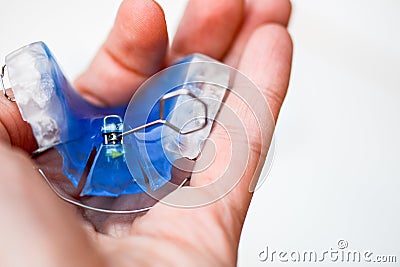 Dental Blue Removable Brace or Retainer for Teeth, Orthodontic Stock Photo