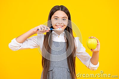 Dental care, hygiene and child. Teenage girl with toothbrush brushing teeth. Stock Photo
