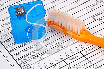 Dental claim form with toothbrush Stock Photo