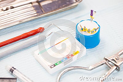 dental equipment and instruments on a sterile table. root canal treatment instruments Stock Photo