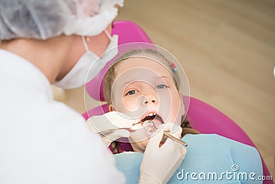 Dental exam , small girl in dental clinic Stock Photo