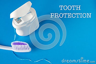 Dental floss and toothbrush Stock Photo