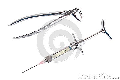 Dental forceps and syringe Stock Photo