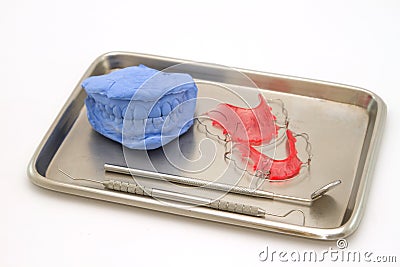 Dental gypsum models and dental brace in medical tray Stock Photo