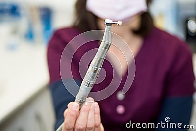 Dental handpiece with polishing brush. Dental Instruments Stock Photo