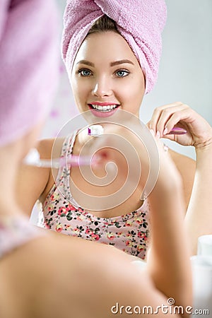 Dental hygiene brushing teeth young girl toothbrush Stock Photo