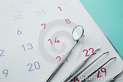 Dental Hygiene and Health concept. Reminder dentist appointment in calendar and professional dental tools Stock Photo