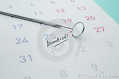 Dental Hygiene and Health concept. Reminder dentist appointment in calendar and professional dental tools Stock Photo