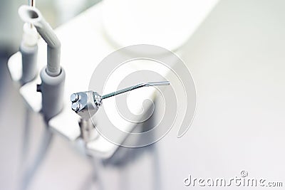 Dental instrument in stomatology clinic. Close up compressed nozzle air and saliva ejector. Professional dentist tools. Copy space Stock Photo