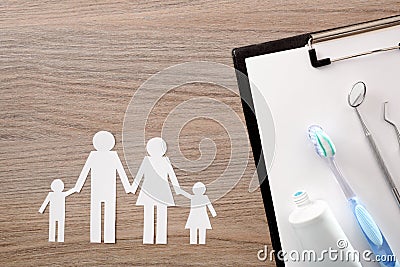 Dental insurance on wood table for the whole family Stock Photo