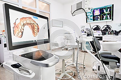 Dental intraoral scanner in modern clinic. Stock Photo