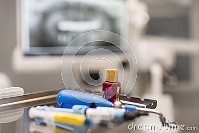 Dental resin filling materials syringe, etching enamel gel, adhesive bonding system for restorative dentistry and x ray panoramic Stock Photo