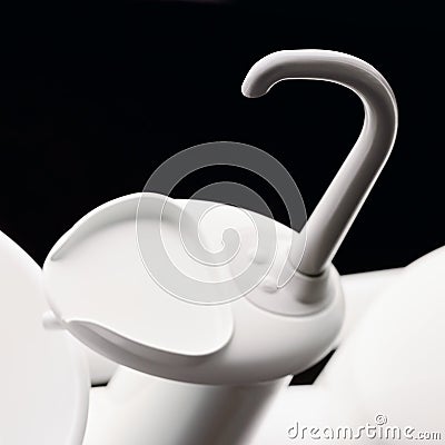 Dental Spittoon and glass sink. Washbasin in dentist cabinet. Spit sink at dentisl office. Stomatological equipment Stock Photo